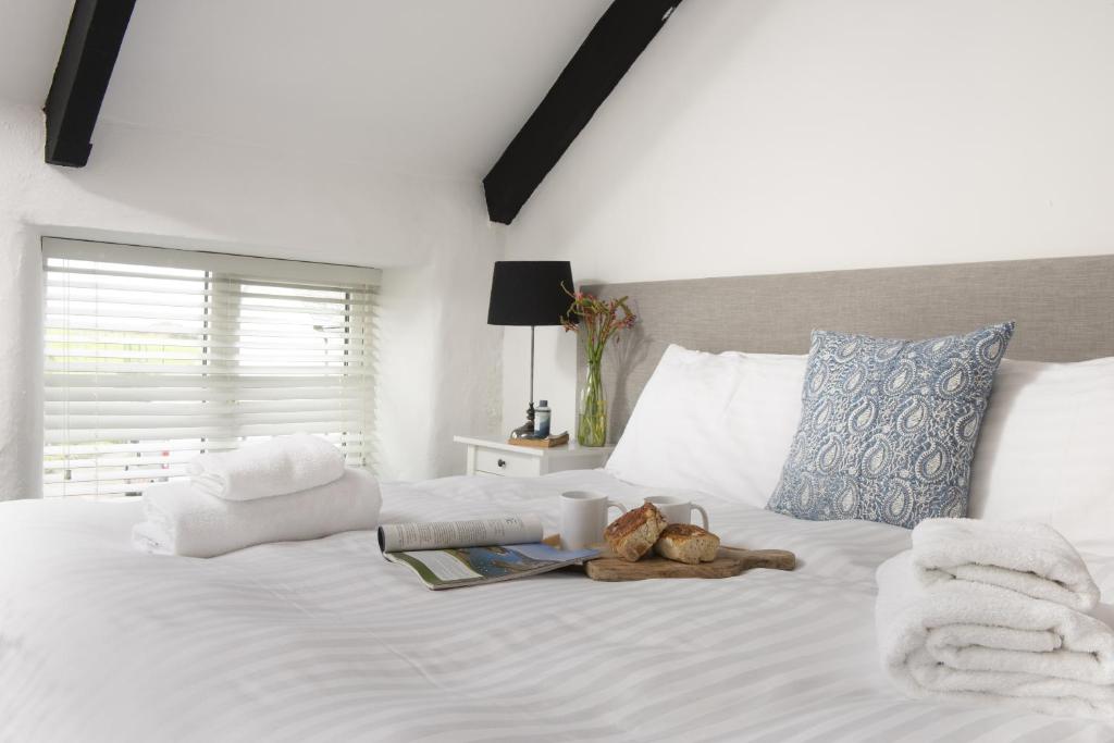 Voodi või voodid majutusasutuse Cape Cornwall Club toas