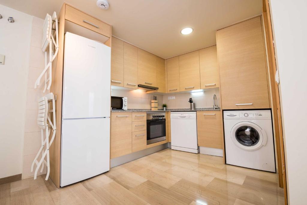 Kuchyň nebo kuchyňský kout v ubytování Apartaments Peronel.la