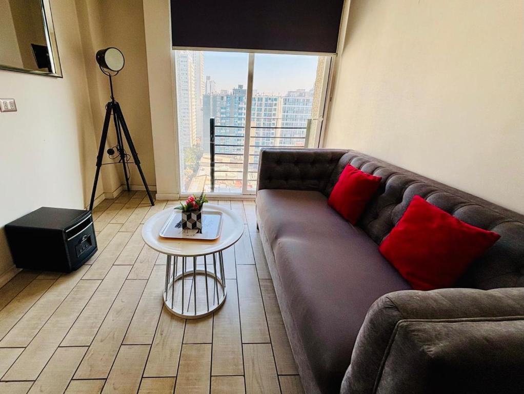 Et opholdsområde på Hermoso Apartamento en la Capital de Chile