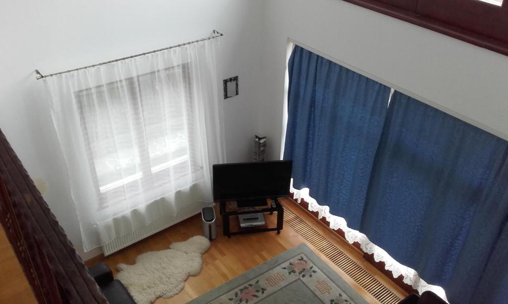 TV a/nebo společenská místnost v ubytování Lycorn