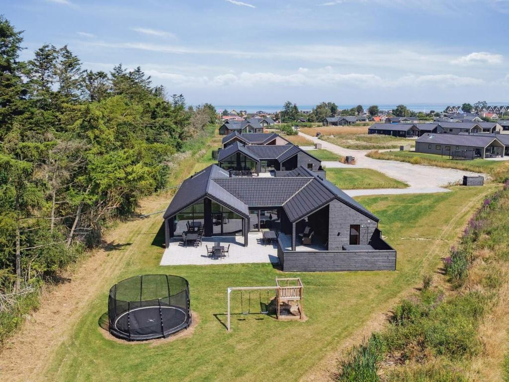 an aerial view of a house with a basketball hoop at 5 star holiday home in Otterup in Otterup