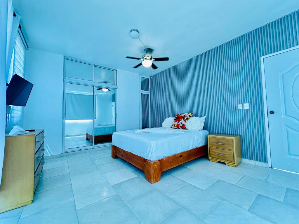 Ένα ή περισσότερα κρεβάτια σε δωμάτιο στο Apartartamento cabarete