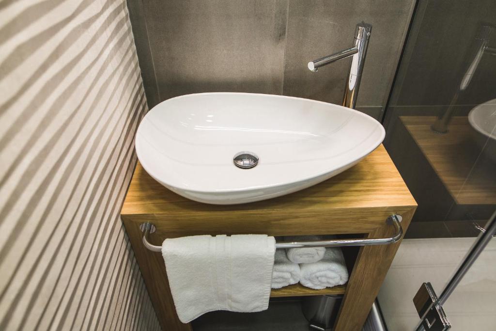 Kúpeľňa v ubytovaní Sir George Luxury Suites