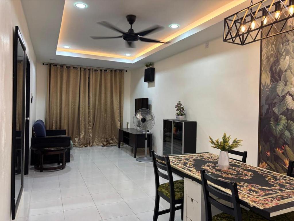 Et opholdsområde på Casa Cinta Homestay Pendang