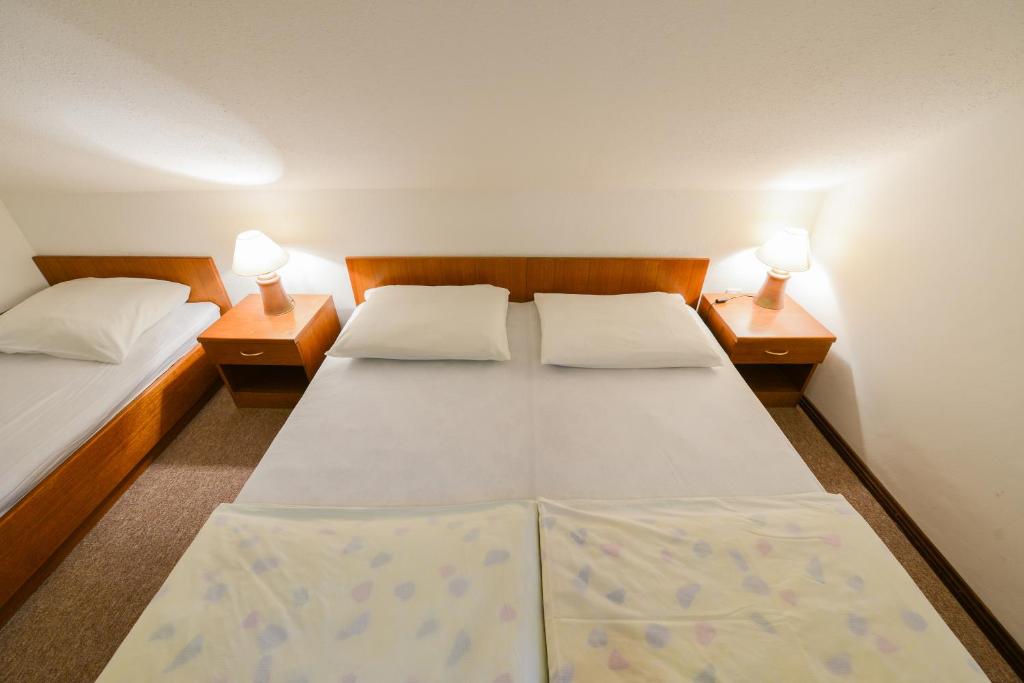 Postel nebo postele na pokoji v ubytování Guest House Bakhus