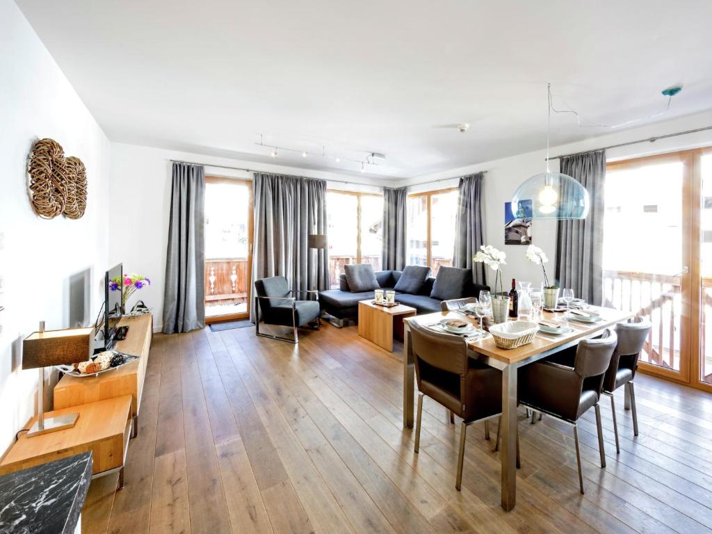 a living room with a table and a couch at Apartment in Gerlos near Ski Lift in Gerlos