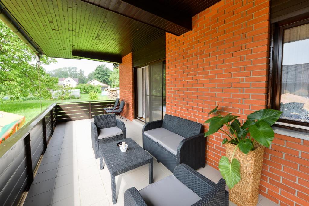 Posezení v ubytování Guest House Bakhus