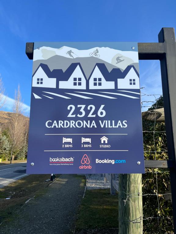 a sign for a carolina villas at Studio 18 Cardrona in Cardrona