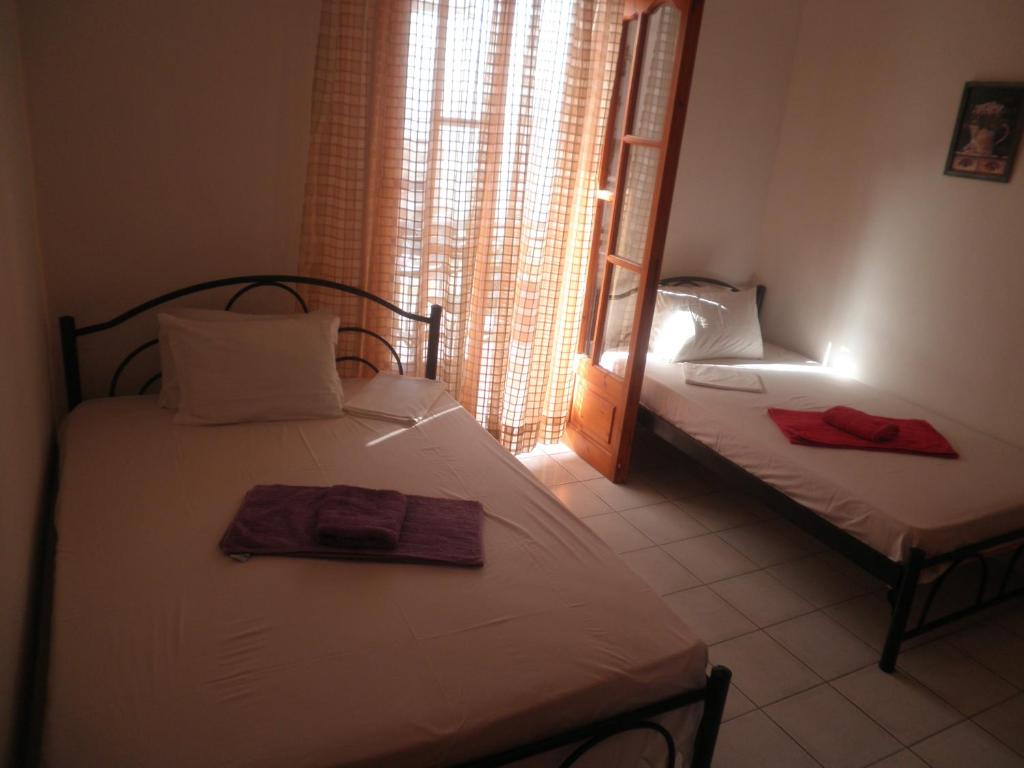 Posteľ alebo postele v izbe v ubytovaní Eleni Antonouli Rooms