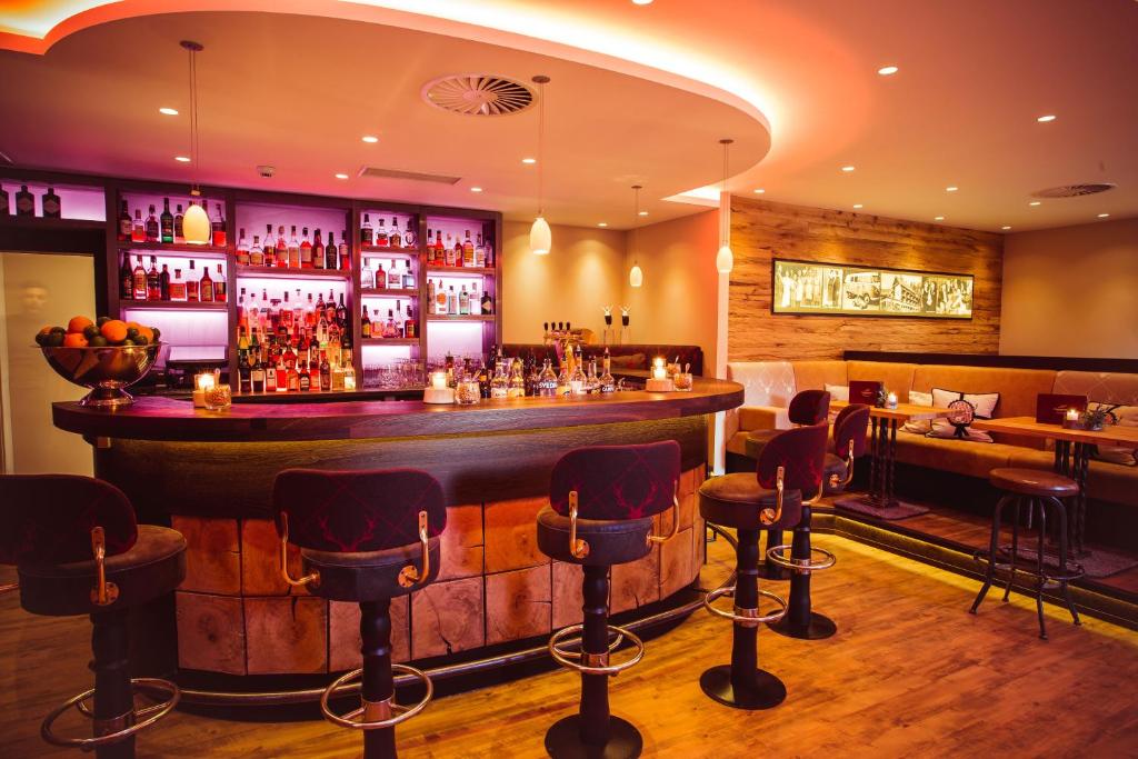 Lounge nebo bar v ubytování Romantischer Winkel RoLigio & Wellness Resort