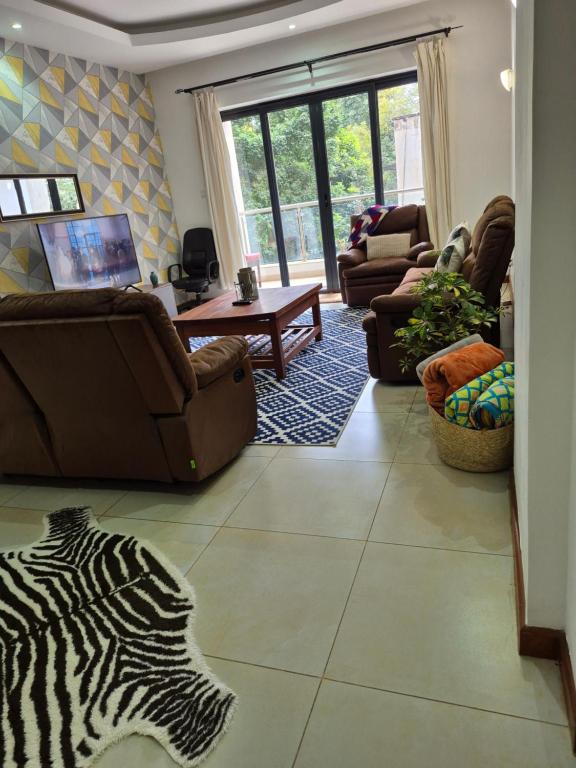 Χώρος καθιστικού στο Aramis Apartments Deluxe Retreat at the Centre of Westlands with Pool & Functionional Gym