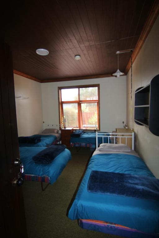 Postel nebo postele na pokoji v ubytování Big Tree Lodge Methven