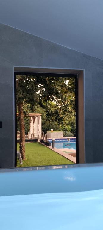 a view of a swimming pool from a tv screen at Villa Boreal in El Gastor