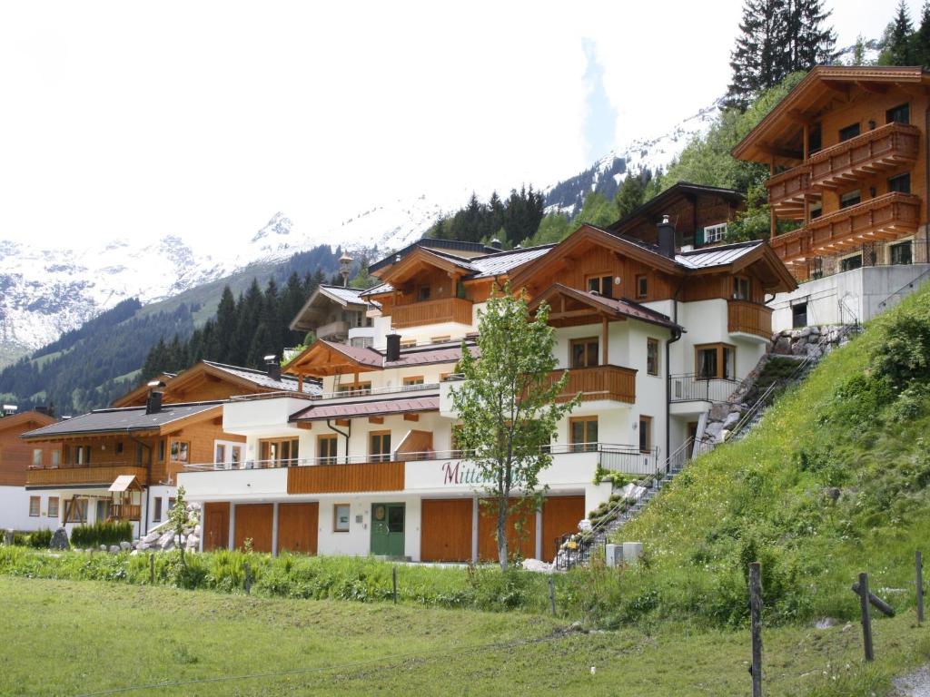 a building on the side of a mountain at Detached Chalet in Saalbach in Saalbach-Hinterglemm