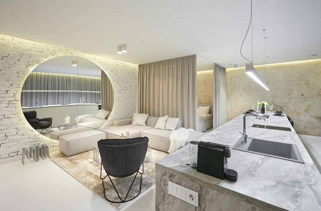 a living room with a couch and a table at Provokatas in Kaunas