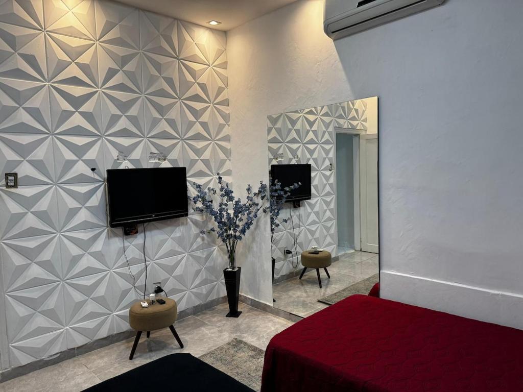 Μια τηλεόραση ή/και κέντρο ψυχαγωγίας στο Casa Próxima a Praia de SV