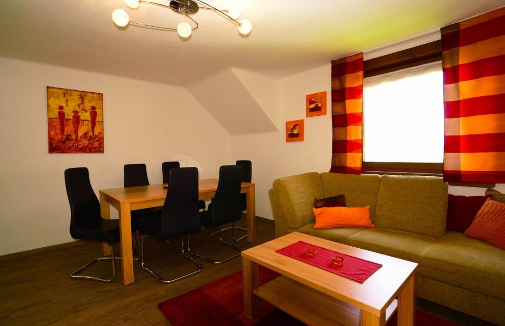 A seating area at Apart of me Ferienhaus Faaker See