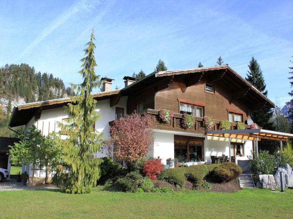 a large house with a balcony on top of it at Apartment in Hinterbichl near Ski Bus in Reutte