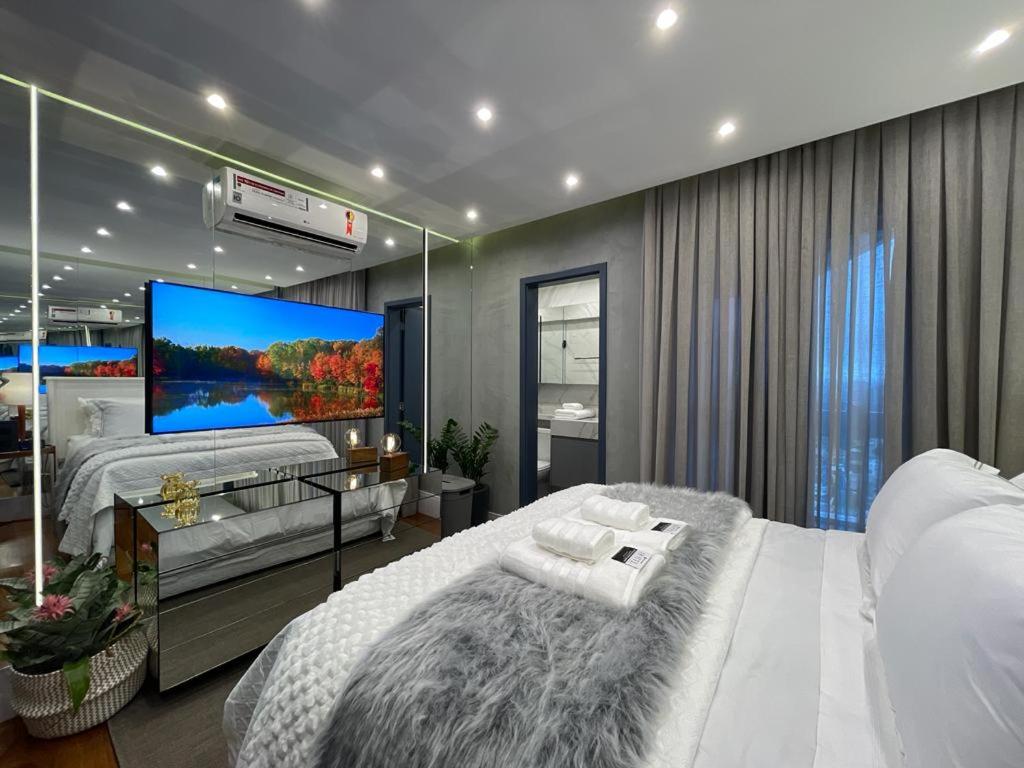 Postel nebo postele na pokoji v ubytování Luxury Apartment Alphaville