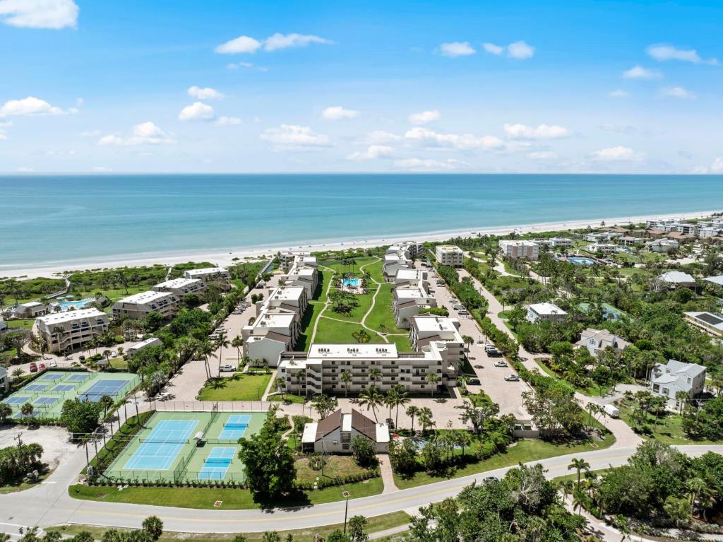 an aerial view of the resort and the beach at Steps To The Beach Loggerhead 472 in Sanibel