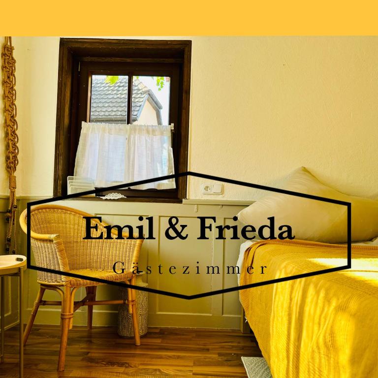 a bedroom with a bed and a window at Gästezimmer Emil&Frieda in Besigheim