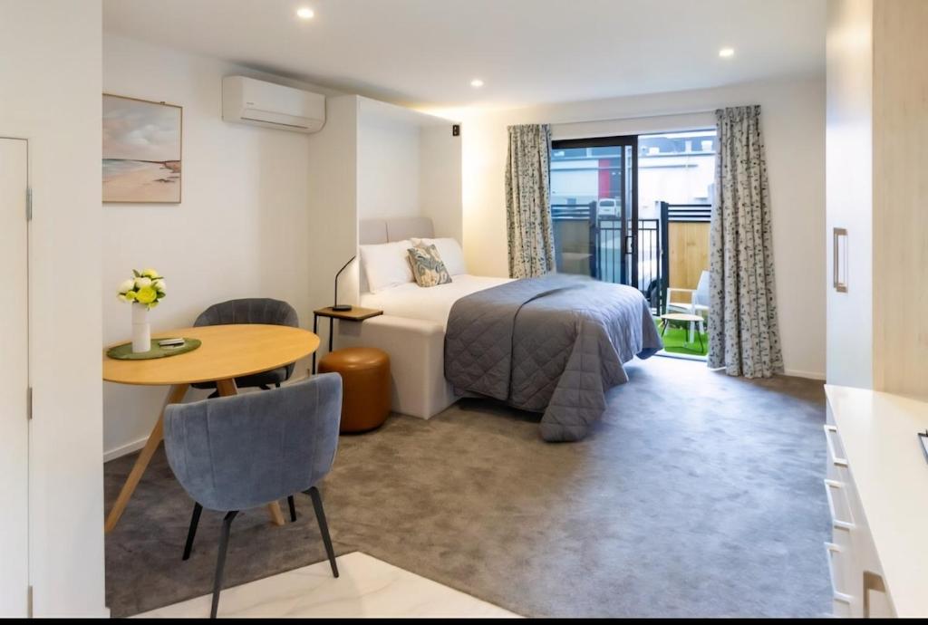 Ένα ή περισσότερα κρεβάτια σε δωμάτιο στο Trendy Studio in the City