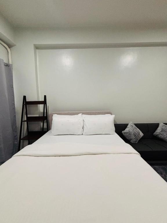 Katil atau katil-katil dalam bilik di WV 27 Restful City Space