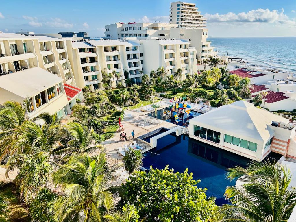 an aerial view of the resort and the ocean at Solymar Beach Condos in Cancún