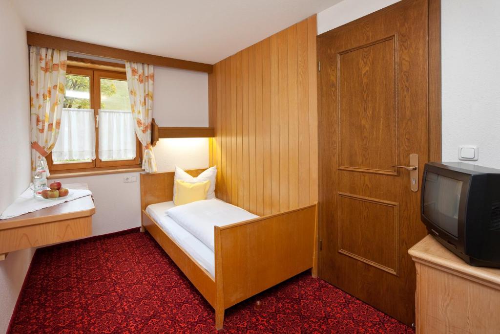 Postel nebo postele na pokoji v ubytování Gästehaus Widderstein