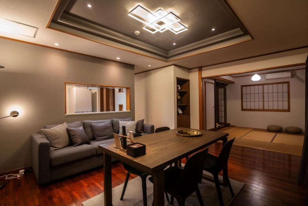 a living room with a couch and a table at HOTEL SPICE - Vacation STAY 34504v in Ishigaki Island