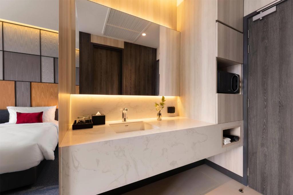 Ramada Plaza by Wyndham Bangkok Sukhumvit 48 - Resim 28