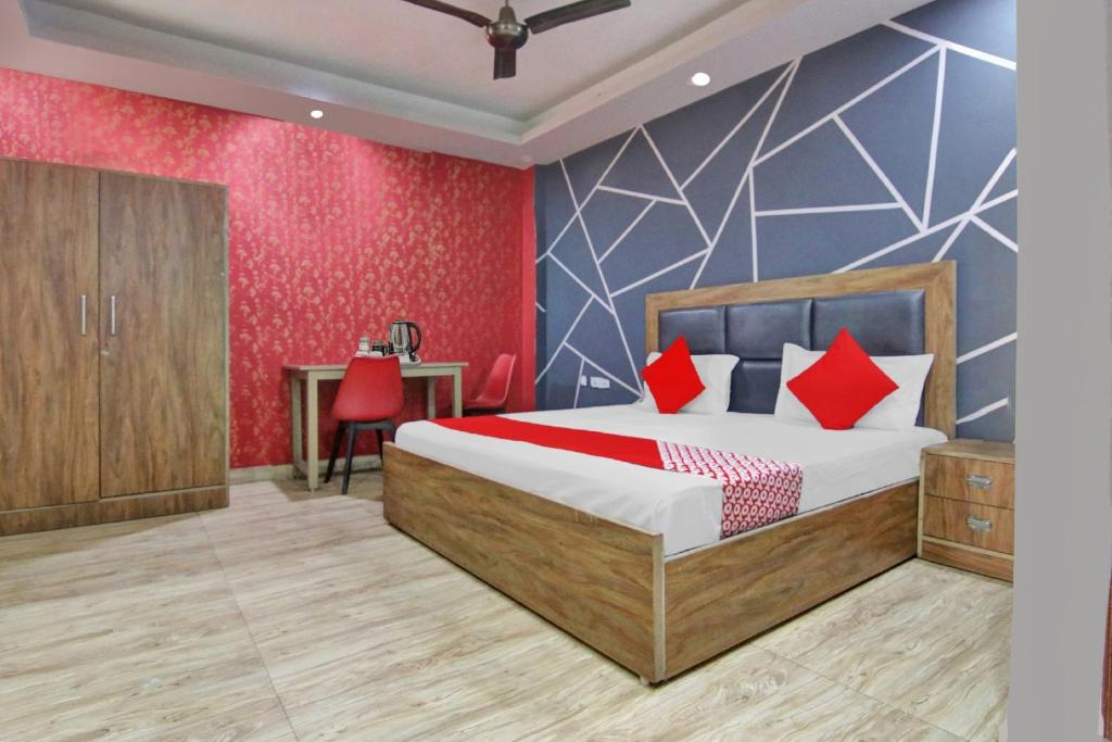 Ένα ή περισσότερα κρεβάτια σε δωμάτιο στο Super Hotel O Green Villa