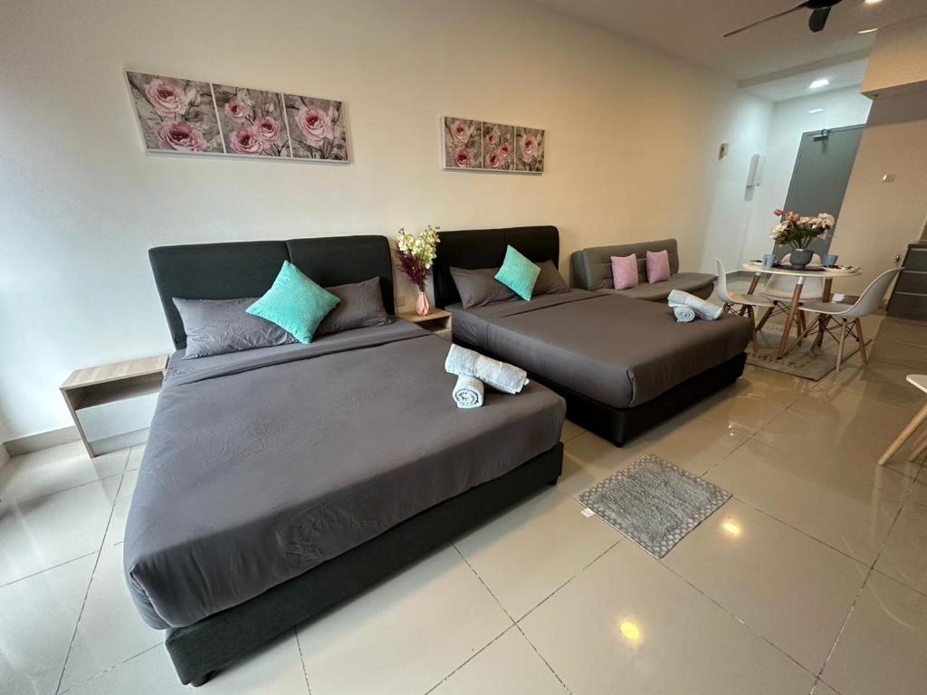 Ένα ή περισσότερα κρεβάτια σε δωμάτιο στο Alinea suites DSM near by shah alam