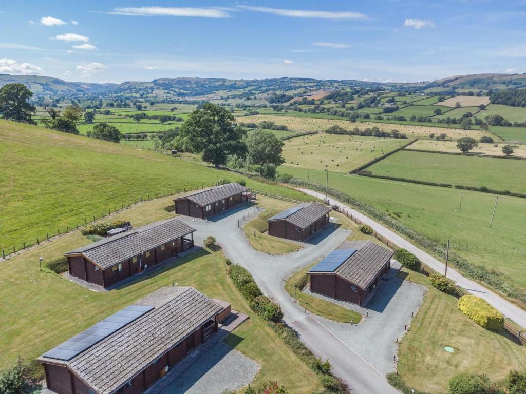 an overhead view of a building in a field at 2 Bed in Llandinam oc-t32993 in Llandinam