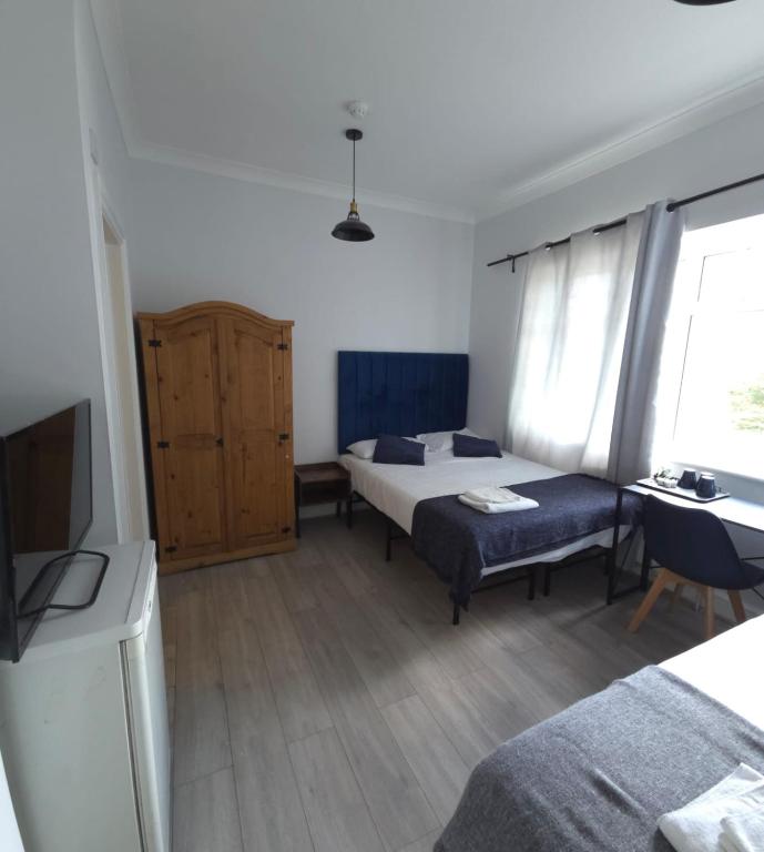 Golders Park Hotel - Habitación Triple Confort