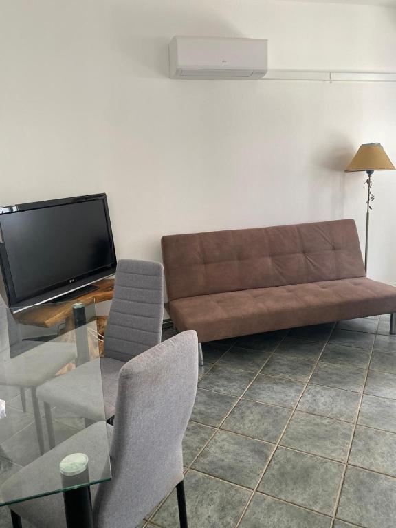 TV a/nebo společenská místnost v ubytování Casa d'Aldeia