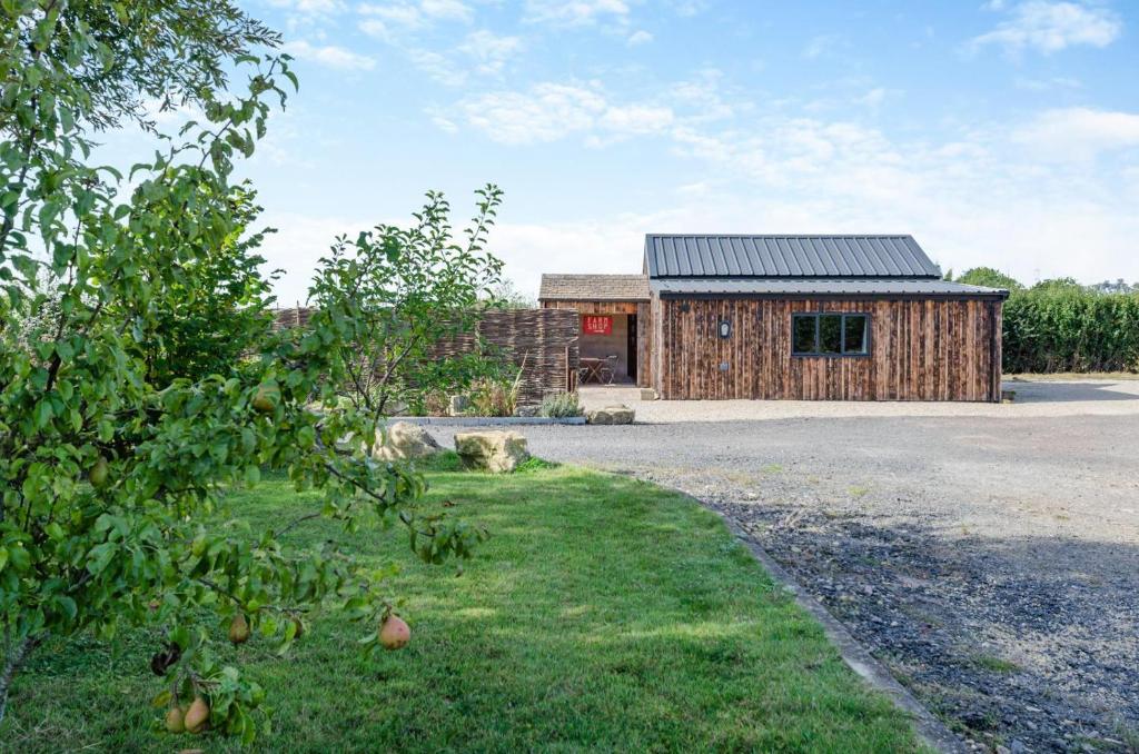 Κήπος έξω από το Orchard Farm Retreat