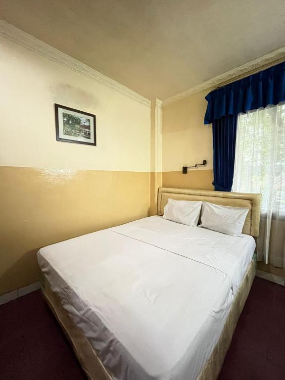 Una cama o camas en una habitación de NamRoom at Margot Jaksa