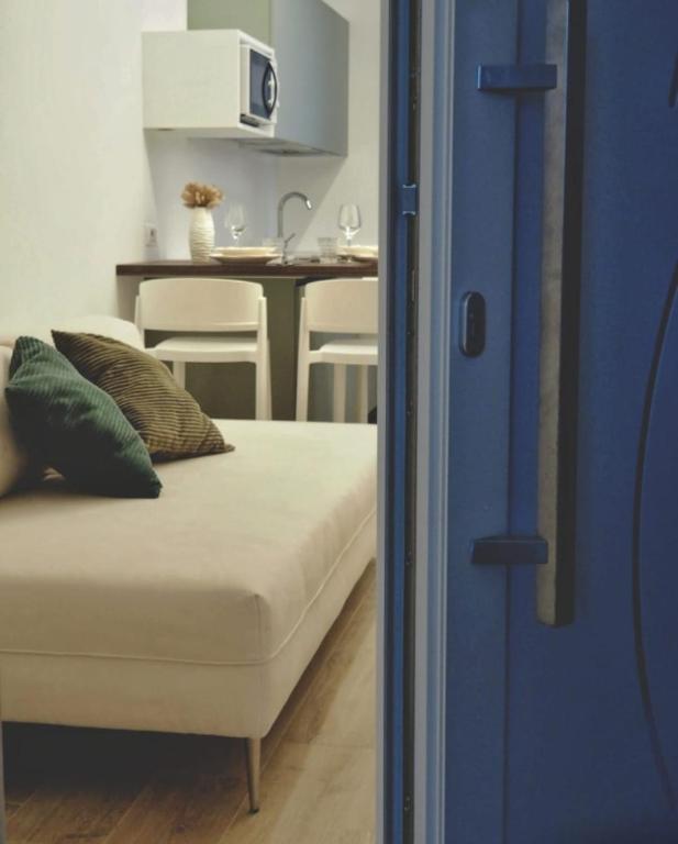 Ένα ή περισσότερα κρεβάτια σε δωμάτιο στο NORA Apartment 1