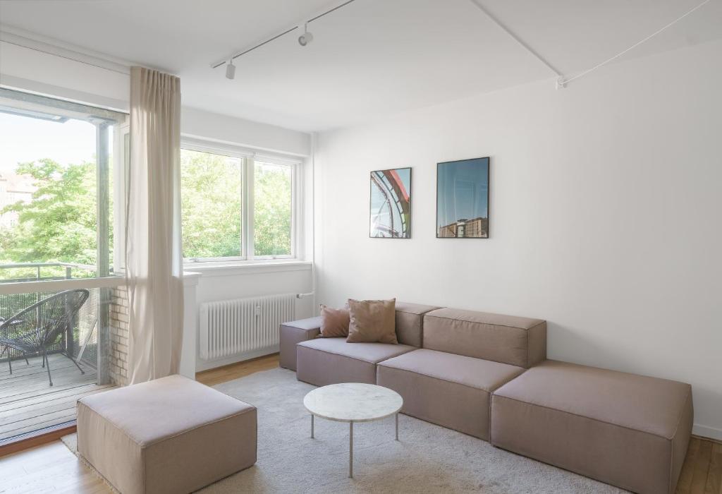 Posezení v ubytování Beautiful 2-BR w a balcony in Frederiksberg - 205