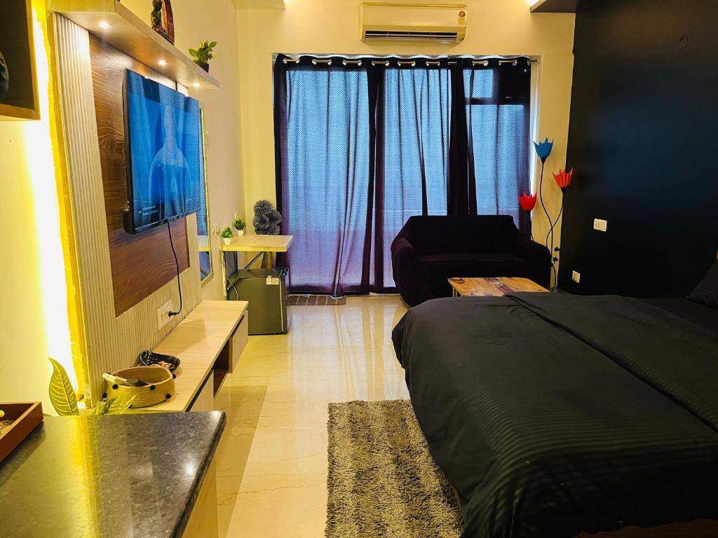 Ένα ή περισσότερα κρεβάτια σε δωμάτιο στο Shree shyam studio