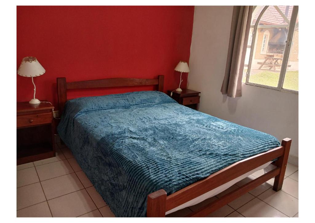 Ένα ή περισσότερα κρεβάτια σε δωμάτιο στο Cabaña 5C Azahares del Ayui