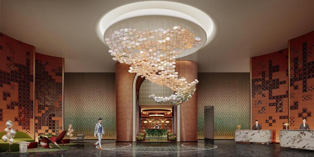 Una representación de un vestíbulo con una gran lámpara de araña. en Hotel Indigo Chengdu Financial City, en Chengdú
