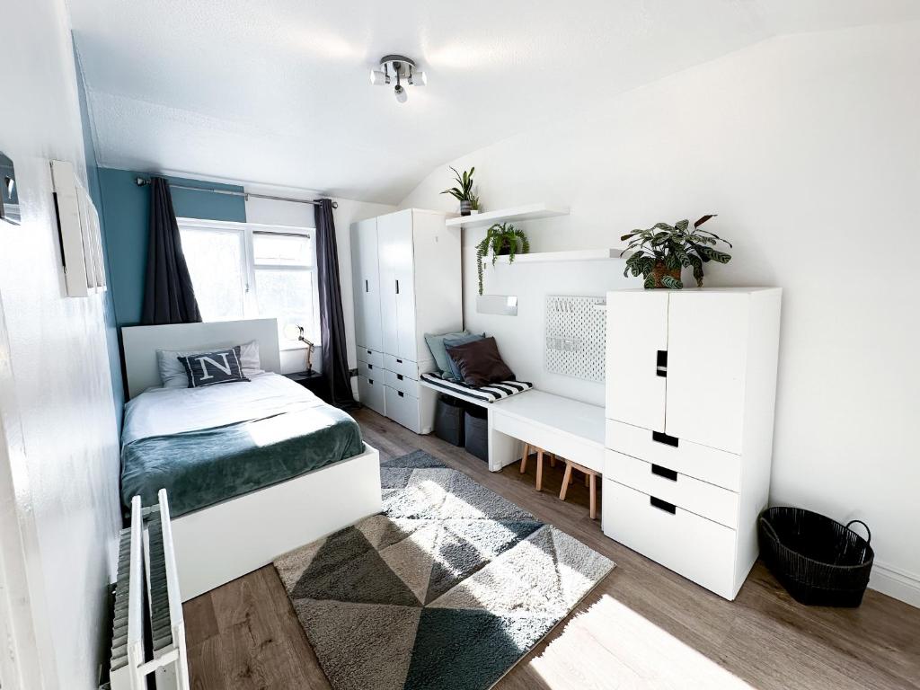 Ένα ή περισσότερα κρεβάτια σε δωμάτιο στο Spacious Single Room