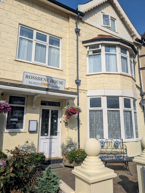 a house with a white ball in front of it at Rossdene House in Blackpool