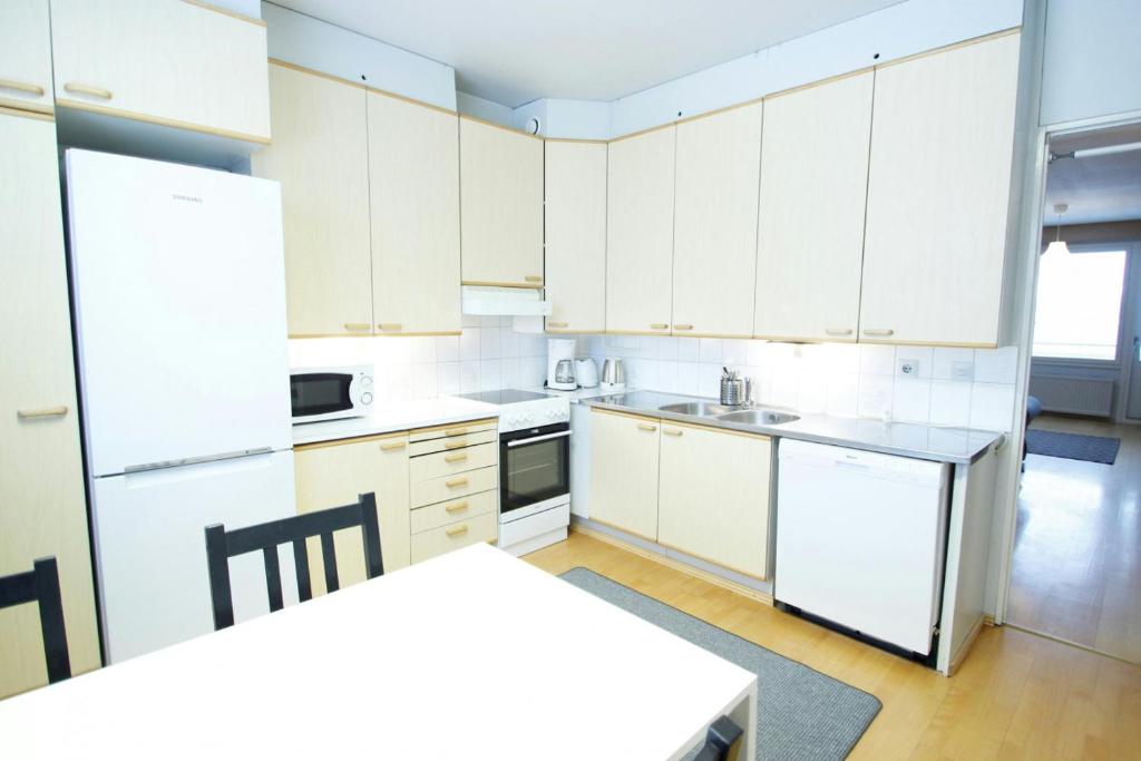 Η κουζίνα ή μικρή κουζίνα στο Spacious Apartment for 5