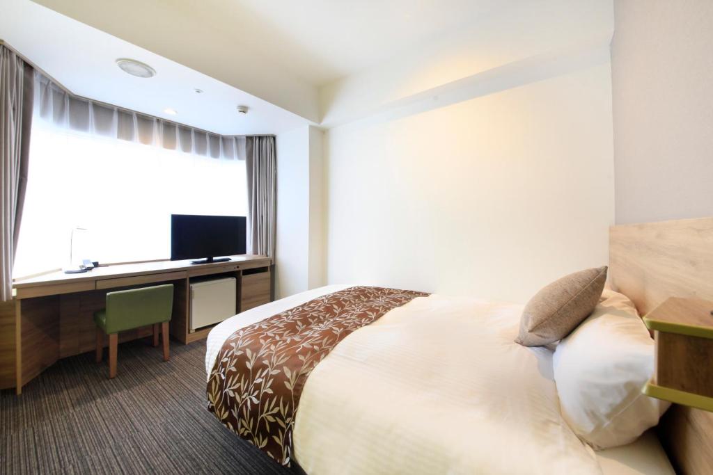 TV a/nebo společenská místnost v ubytování Hotel Sunshine Utsunomiya