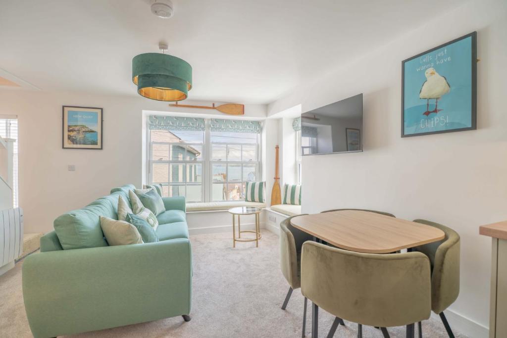 Et tv og/eller underholdning på Mermaid's Apartment by Ty Annie Holidays