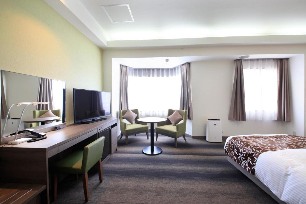 TV a/nebo společenská místnost v ubytování Hotel Sunshine Utsunomiya