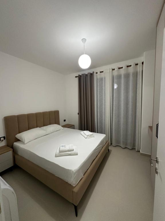Postel nebo postele na pokoji v ubytování Elois Seaview Apartment